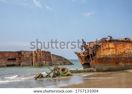 View of a abandoned ships carcasses in the ships cemetery, graveyard ships on the atlantic ocean, Angola, Africa Royalty-Free Stock Photo #1757131004