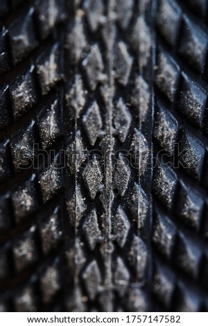 Bicycle wheel close up view. Pattern of mountain bike tyre