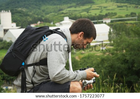 young man with a drone