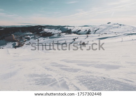 top of the snowy mountain and ski road