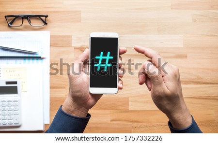 Social media and creativity concepts with Hashtag sign on smartphone.digital marketing images.power of conversation.top view