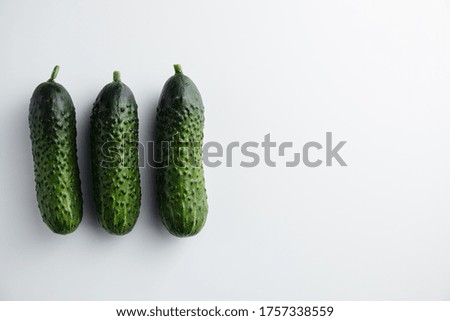 Cucumber on a white background. Minimum concept. Top view