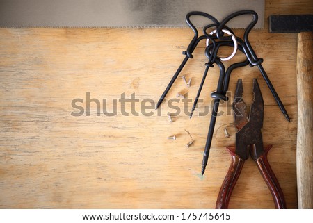 Close-up tools on a wooden background 