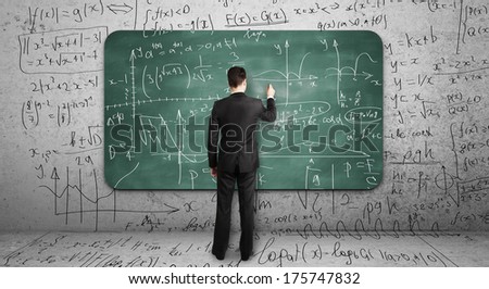 businssman drawing mathematical formula  on blackboard