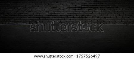 Black brick and stucco background, subtle textured backdrop, creative vignette copy space, horizontal aspect
