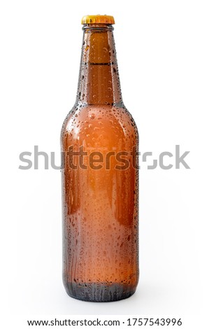 Cold refreshment and alcoholic beverages concept with picture of wet generic brown bottle of beer without branding covered in water droplets isolated on white background with clipping path cutout