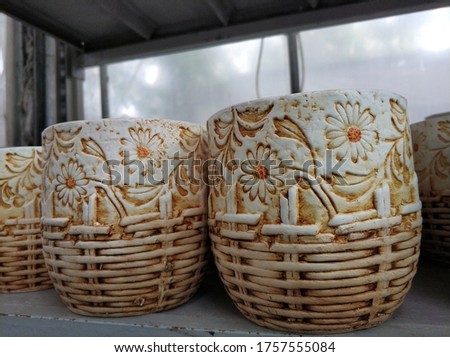 ceramic flower pots on store shelves