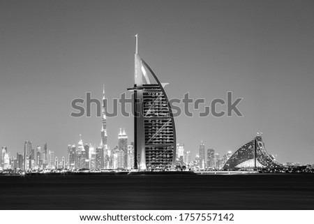 Dubai - amazing night view city center skyline and famous Jumeirah beach, United Arab Emirates