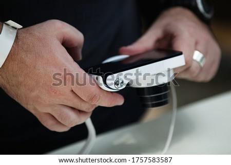hands holding digital photo camera