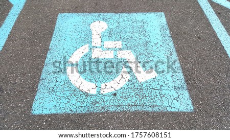 White Disabled Symbol in Blue Square
