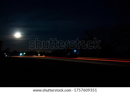 night landscape car lights at highway