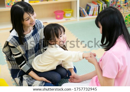 Girl undergoing medical examination in a nursery Royalty-Free Stock Photo #1757732945