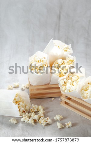 popcorn bag inside wooden box