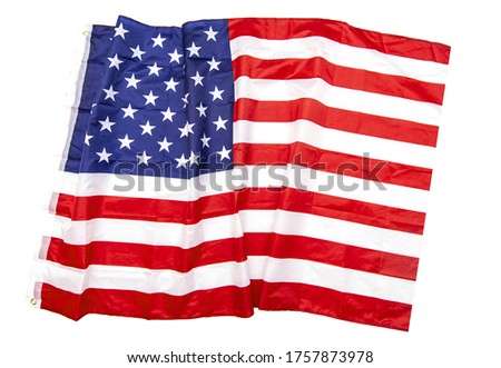 Isolated natural fabric crumpled USA flag, rag American flag top view as texture or background, high resolution picture