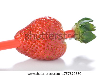 Life hack; Insert the straw into the side opposite to the stem and press it up through the center of the strawberry