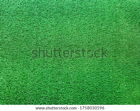 Artificial grass background with copy space.green wallpaper for text and picture.green texture