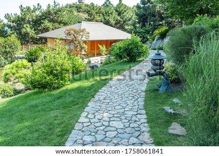 Beautiful Japanese Garden with garden path in summer - Image