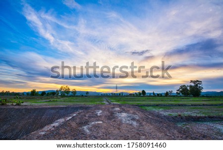 Landscape picture about rice fields, And beautiful sky In the rainy season