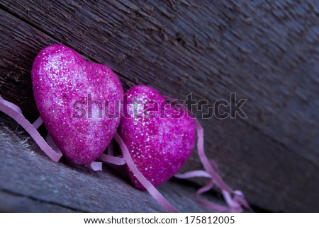 pink hearts on wood