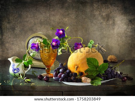still life with melon, grapes and flowers
