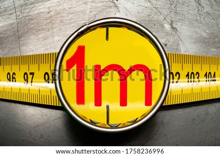 measure tape one meter social distancing due to a coronavirus pandemic Royalty-Free Stock Photo #1758236996