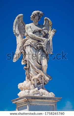 Statue on the angel bridge in the midday sun Royalty-Free Stock Photo #1758265760