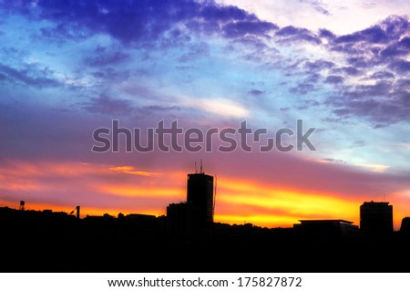 Sunrise in Belgrade, abstract sky and silhouettes of buildings