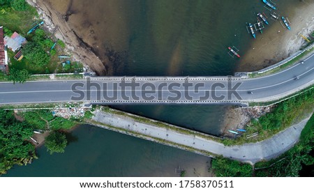 Aerial View of the road crossing the river