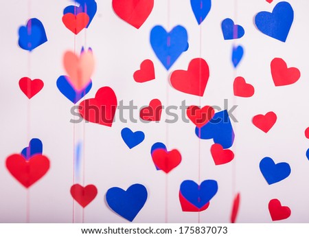 Background of red and blue paper hearts