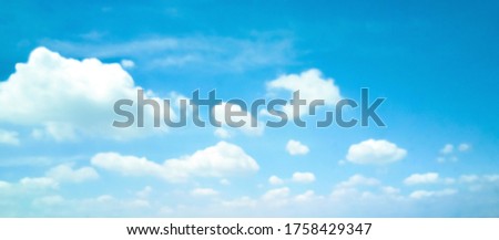 Beautiful blue sky and white clouds of various shapes with sunlight. Nature background Royalty-Free Stock Photo #1758429347