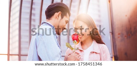 Focus of lovers That give roses Bright smiley face Feeling of love each other, banner image size