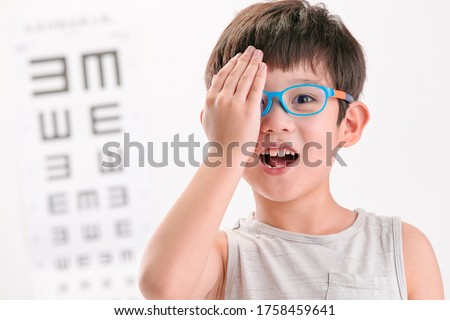 The little boy an eye test