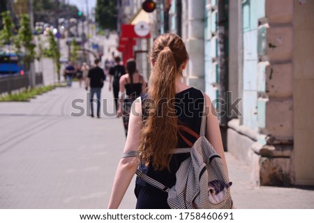 People walking in a leisure park in a metropolis