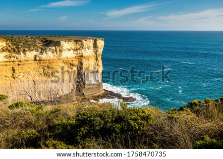 View from the Great Ocean Road over the coast near to the London Bridge in Victoria, Australia at a sunny day in summer.