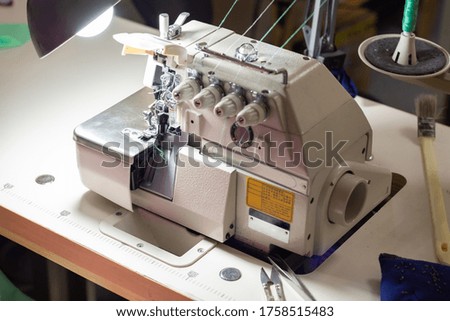 a industrial sewing equipment with many threads