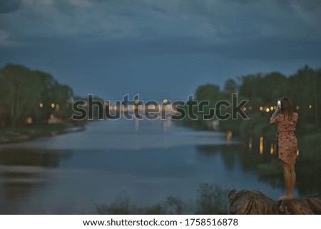 woman smartphone landscape evening view, river landscape shooting photo on the phone at night