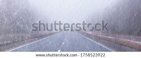 autumn landscape highway rain and fog in europe, dangerous road, bad weather