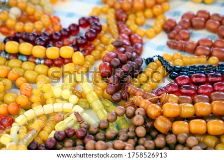 Colorful beads rosaries in the antique shop