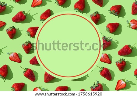 Fresh red strawberries pattern on green background. Copy space for text. Wallpaper, sale, discount, natural cosmetics banner background, horizontal