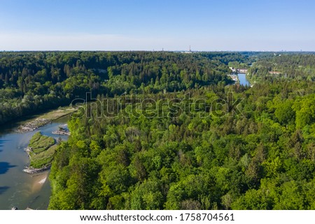 Aerial view of German forest and Isar river flowing to Munich from the Alps.