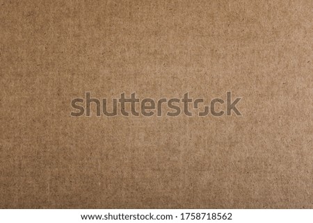 Kraft paper texture. Vintage torn brown sheet of paper. Copy space