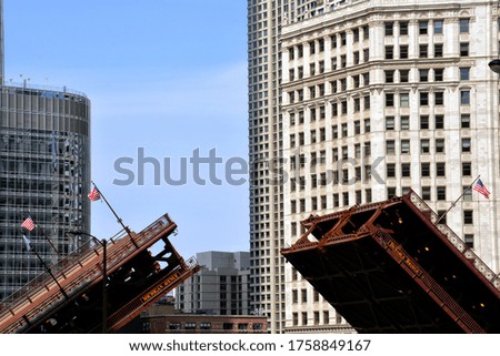 An opening DuSable bridge in Michigan Avenue, Chicago - USA divided concept Royalty-Free Stock Photo #1758849167