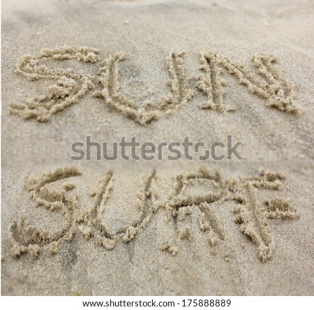 Sun and Surf written in Sand