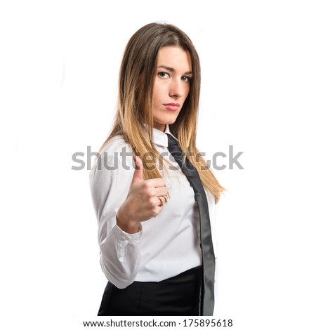 Young woman making Ok sign over white background 