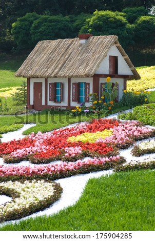 Fairytale cottage (made of flowers). Ukraine, Kiev, Singing field.