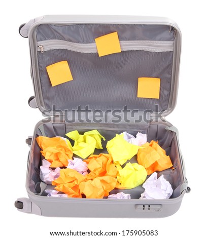 Open suitcase with paper stickers isolated on white