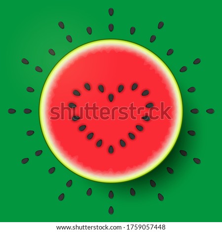 Half of fresh ripe watermelon with heart symbol made from seeds on red pulp surface, over green background. Concept of healthy organic food, raw food diet, cheerful positive dieting