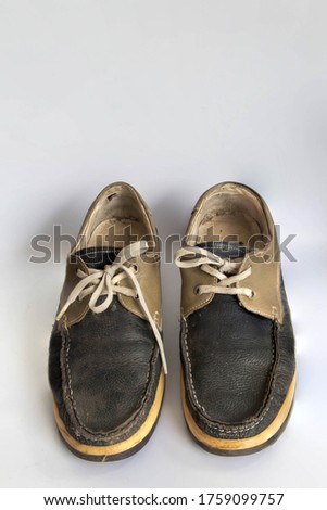 sneakers dirty isolated on white background, Footwear for outdoor activities, clipping path done using pen tool