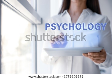 Psychologist working with modern tablet in office, closeup 