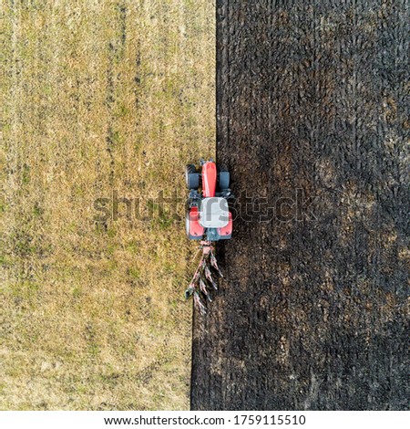 Aerial picture of a tractor plowing a field in Ireland